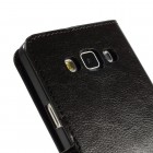Samsung Galaxy A7 atvēramais melns ādas maciņš (maks)