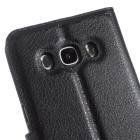 Samsung Galaxy J5 2016 (J510) atvēramais melns ādas Litchi maciņš (maks)